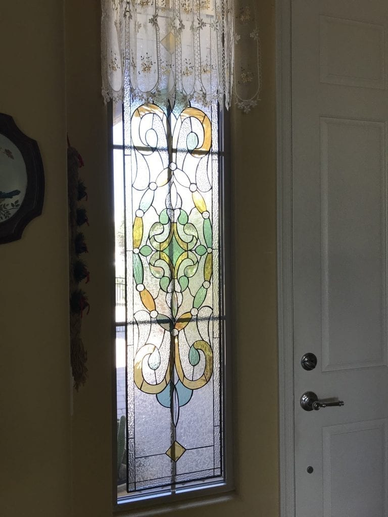 Victorian Stained Glass Window Set Against Existing Window With Grid System And Still Looks 7684