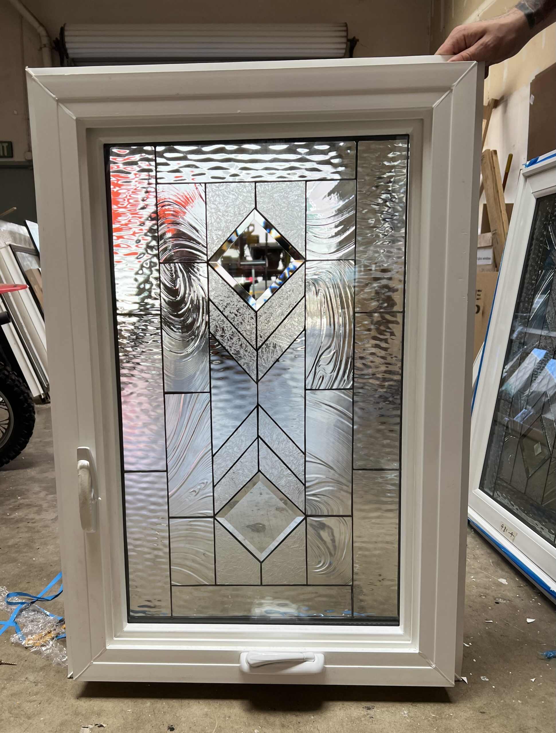 Clear Stained Glass Windows Installed In A Bedroom